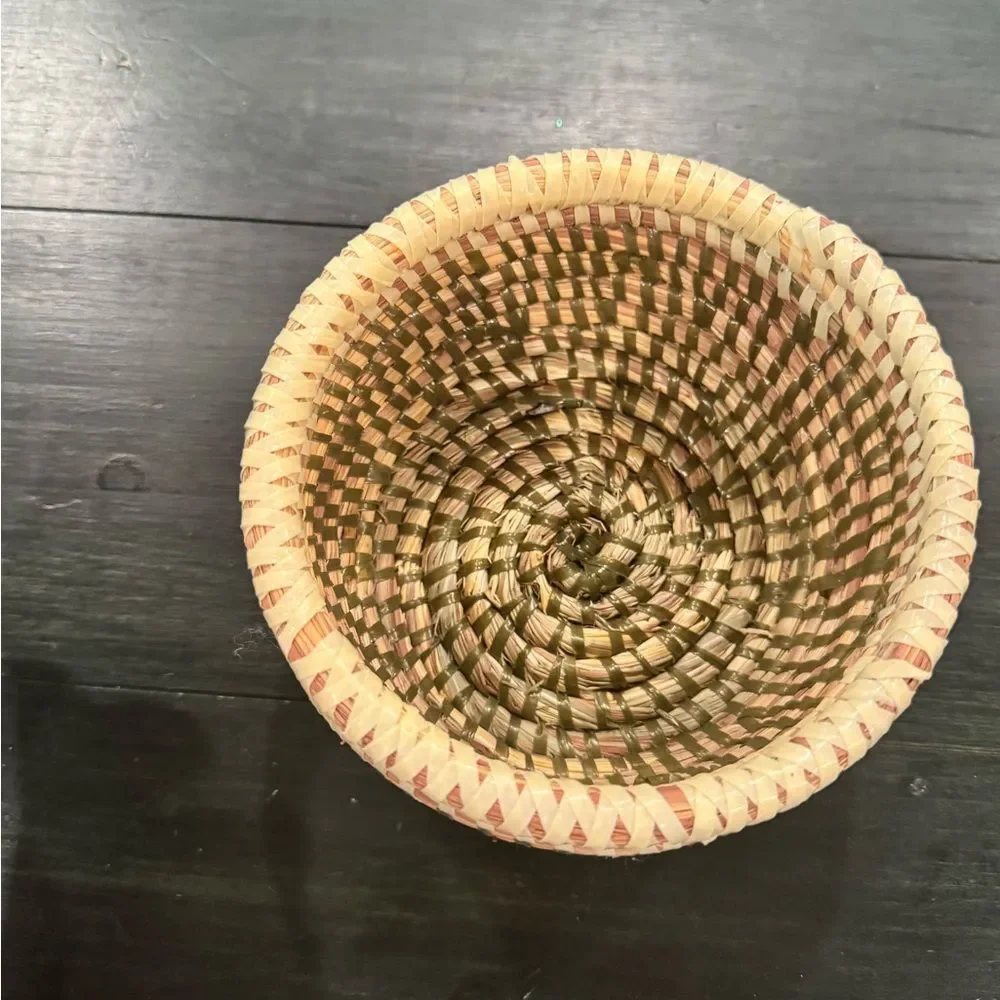 Handwoven sweetgrass coiled basket with a fitted lid
